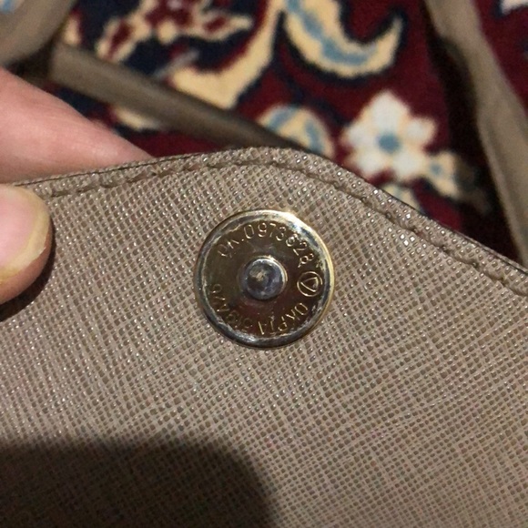 Authentic mikel kors bag with authenticity code written on buttons - Picture 6 of 9